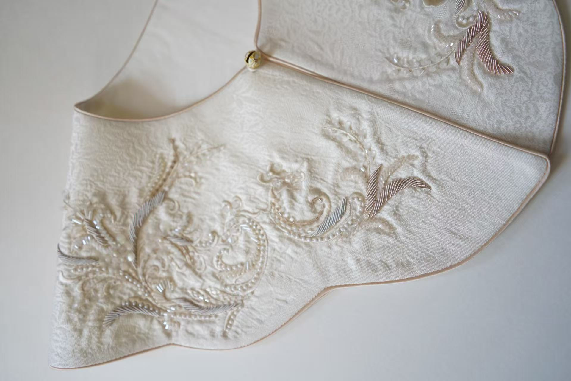 Ivory Bird-Motif Yunjian — photographed detail